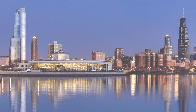 skyline of a major city reflected in a body of water